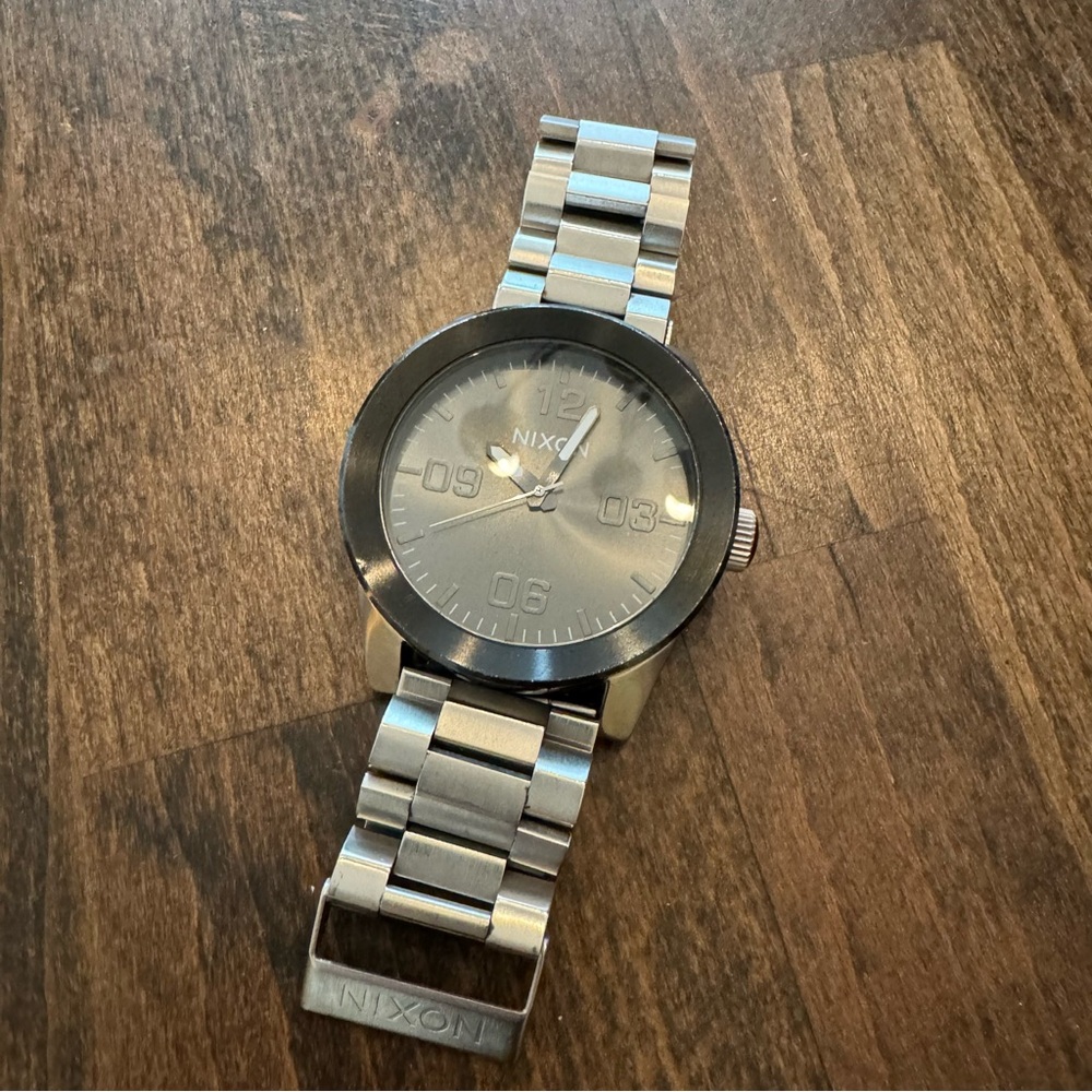 Nixon men’s silver link wrist watch